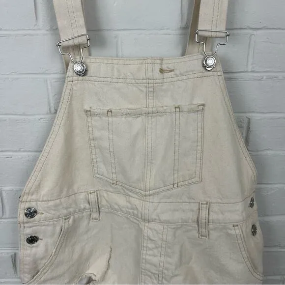 Free People We The Free Cream Distressed Denim Cutoff Short Overalls Size 25