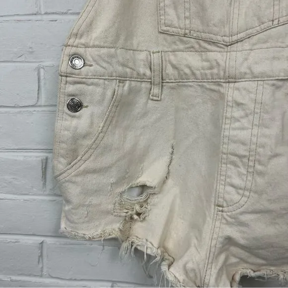 Free People We The Free Cream Distressed Denim Cutoff Short Overalls Size 25