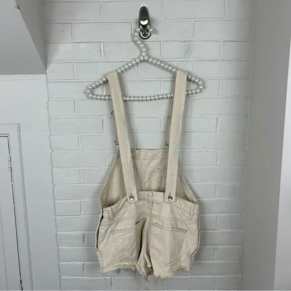 Free People We The Free Cream Distressed Denim Cutoff Short Overalls Size 25