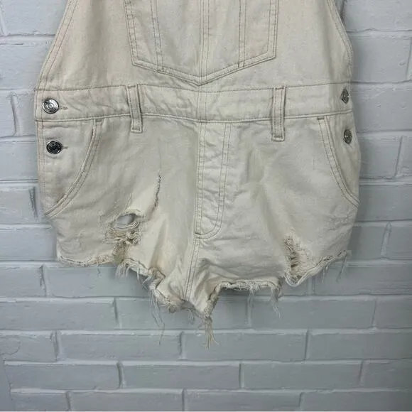 Free People We The Free Cream Distressed Denim Cutoff Short Overalls Size 25