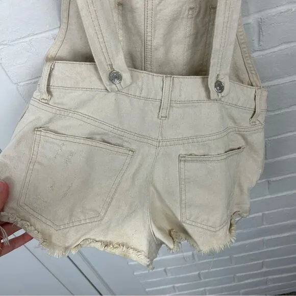 Free People We The Free Cream Distressed Denim Cutoff Short Overalls Size 25